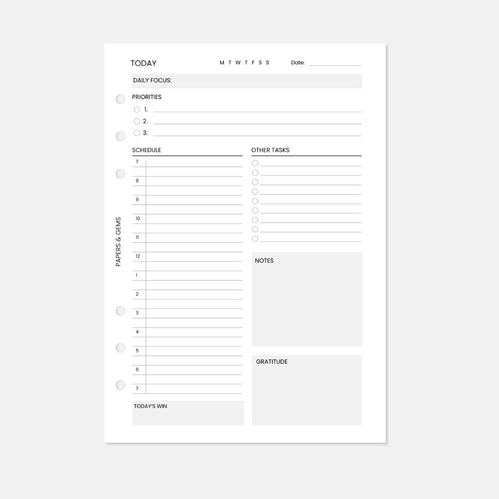 A5 Daily planning insert white pages with six punched holes on a white background