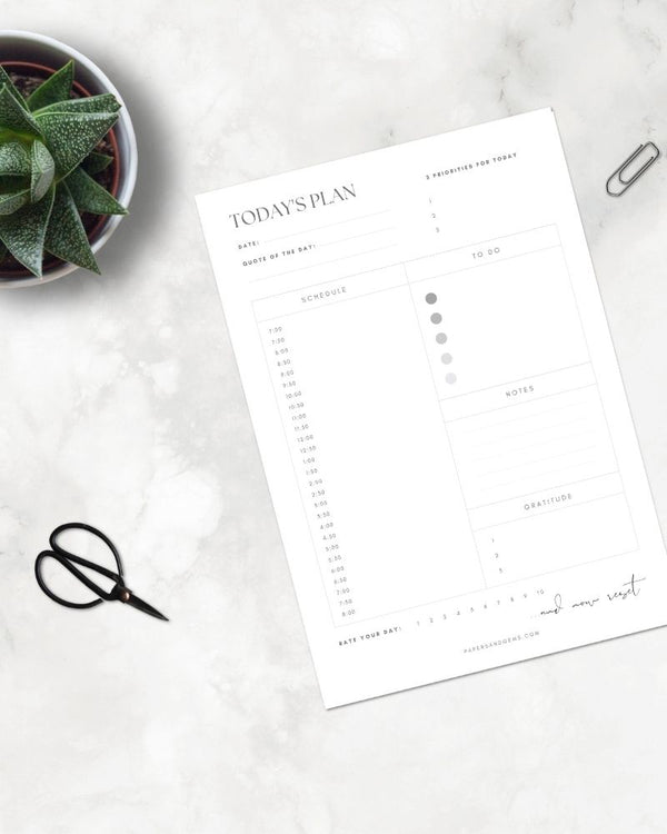 Papers and Gems day planner free download on desk
